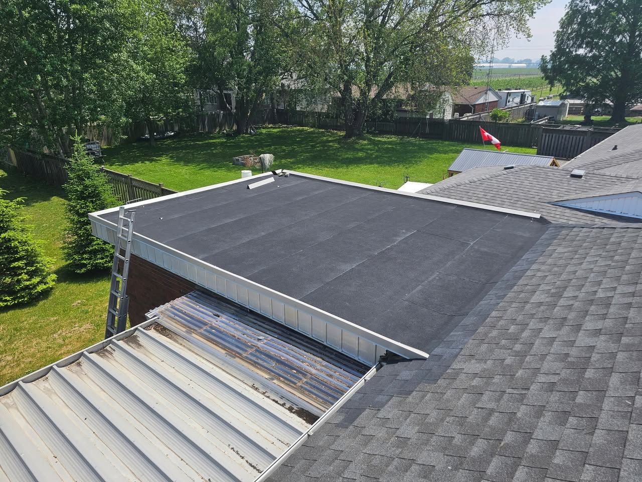 Insurance Claim Side-by-Side Re-Roof — completed roofing work in Niagara Region (photo 4 of 5)